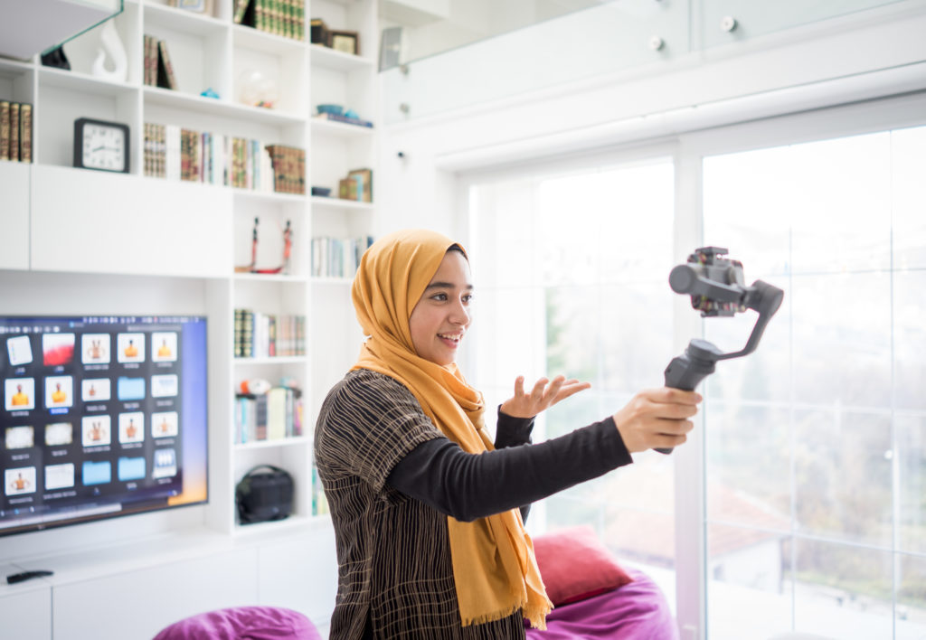 Muslim demonstrating Hijab fashion online
