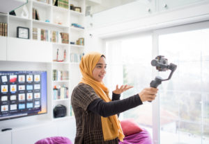 Muslim demonstrating Hijab fashion online