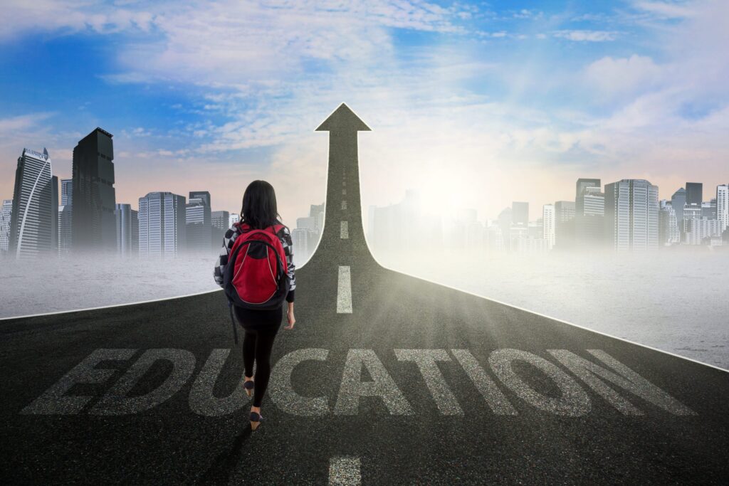 Female on a road called education