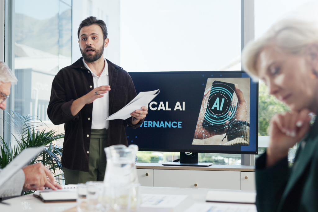 Presentation, paperwork and businessman in office with team for AI governance system. Discussion, professional and IT developer with investors for investment planning with corporate cybersecurity.