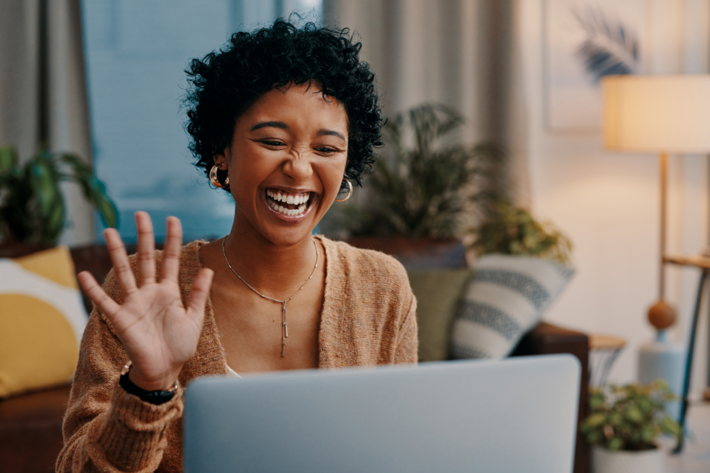 Shot of a young woman making a video call on a laptop at home