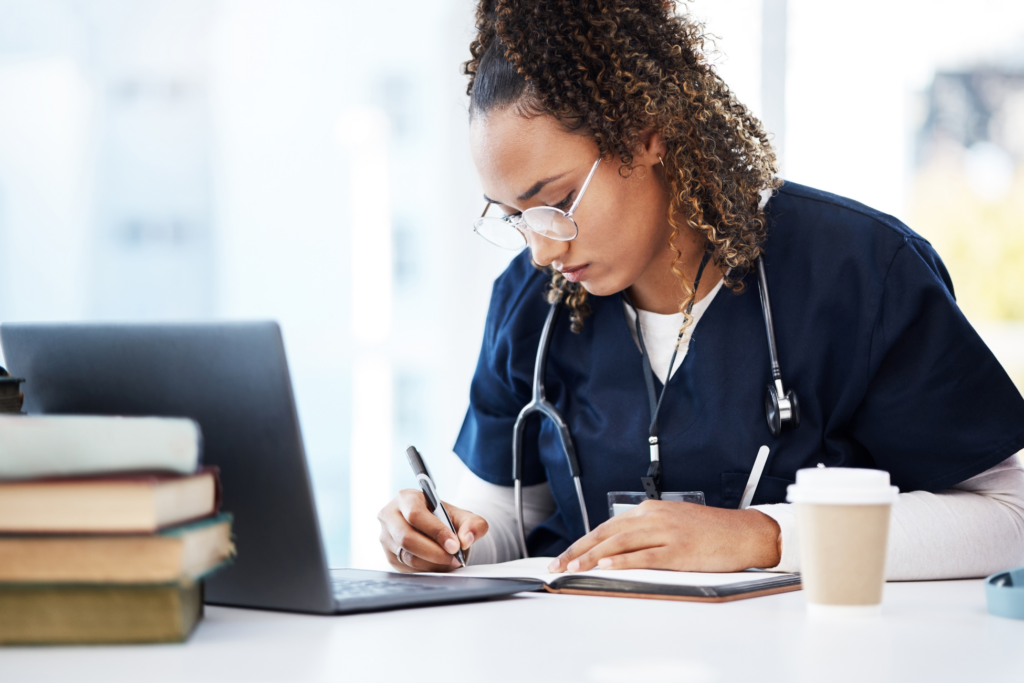 nurse or healthcare woman and notebook studying on a computer