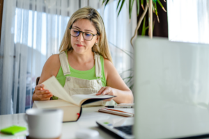 Adult woman taking online lessons at home